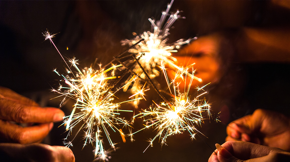 Hands holding sparklers