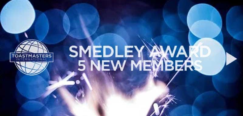 Sparker background with the words 'Smedley Award 5 New Members" with the Toastmaster logo.